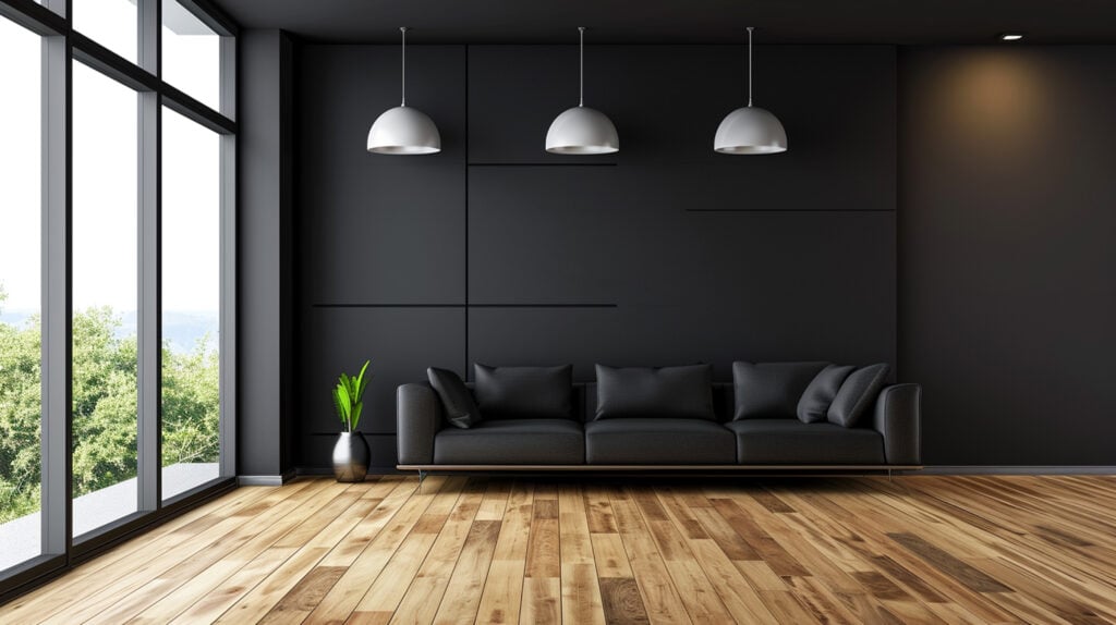 A minimalist black interior with a black sofa